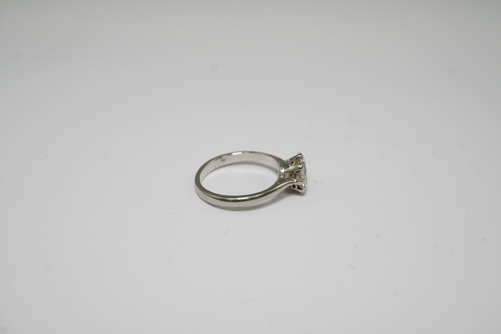 A platinum and solitaire diamond set ring